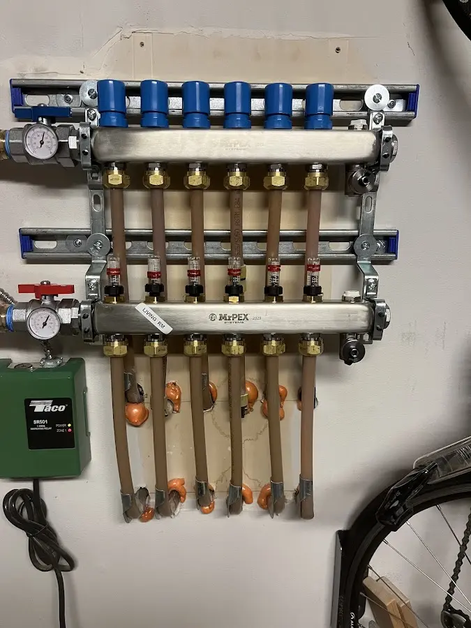 Plumber performing Gas Leak Detection at a residential property in Vienna